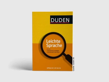 Darstellung des Duden. Darauf die Aufschrift»Leichte Sprache«, das mit einer Lupe hervorgehoben wird.